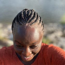 Small cornrows w/twisted updo