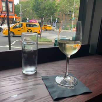 The Headless Widow - Window bar seating. Dope place to grab a glass and people watch. - Cocktail Bars Near Me - New York, New York
