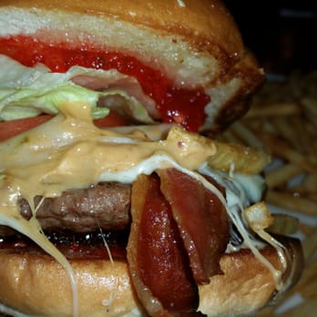 Rivets American Grill - That's jalapeno jelly top and bottom, crunchy peanut butter under melty cheese, a perfect medium-well patty with BLT to boot! - Bars Near Me - Modesto, California