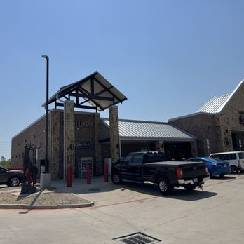 Fatburger - Fatburger and gas station shared storefront and entry - Burgers Near Me - Sanger, Texas