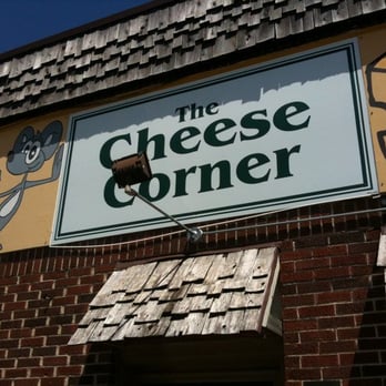 Cheese Corner - a sign on the side of a building - Sandwiches Near Me - Viroqua, Wisconsin Cheese Corner - a sign on the side of a building - Sandwiches Near Me - Viroqua, Wisconsin