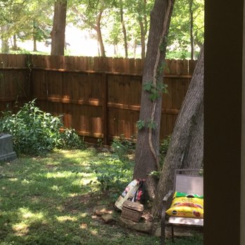 Olde English Window Cleaning - Backyard fence - Pressure Washers Near Me - Montgomery, Texas