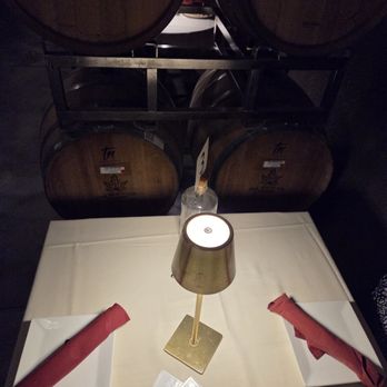 Cave Restaurant - Table setting; tables separated by wine barrels - Venues & Event Spaces Near Me - Temecula, California