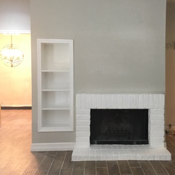 Inven Construction - Custom shelving and repainted the fireplace, replaced flooring and paint, added chandelier in the dining room. - General Contractors Near Me - Houston, Texas Inven Construction - Custom shelving and repainted the fireplace, replaced flooring and paint, added chandelier in the dining room. - General Contractors Near Me - Houston, Texas