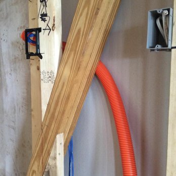 Synergy Florida - Tube wedges between 2x4 and thermal board instead of cutting to fit the tubes. - Security Systems Near Me - Tampa, Florida Synergy Florida - Tube wedges between 2x4 and thermal board instead of cutting to fit the tubes. - Security Systems Near Me - Tampa, Florida