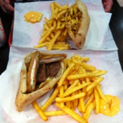 Planète food - top: Chicken curry sandwich, fries & spicy sauce.bottom: Radical sandwich with hamburger, cordon bleu, egg, fries & spicy sauce