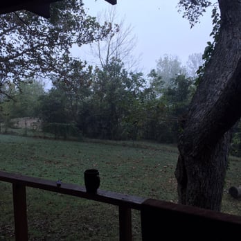 Red Top Cabins - Morning coffee on the deck of cabin 4 - Vacation Rentals Near Me - Sulphur, Oklahoma
