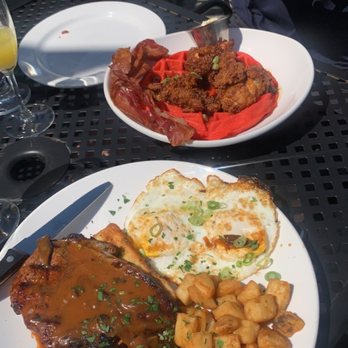 The Terrace - Top: chicken and red velvet waffles Bottom: steak and eggs - Venues & Event Spaces Near Me - Buffalo, Delaware The Terrace - Top: chicken and red velvet waffles Bottom: steak and eggs - Venues & Event Spaces Near Me - Buffalo, Delaware