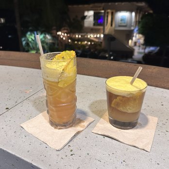 Monkeypod Kitchen by Merriman - Mai Tai on right, Mocktail Mai Tai on left. The best Mai Tai anywhere. I've had it at MonkeyPod in Maui and Waikiki, over the past 3 yrs. - New American Near Me - Kihei, Hawaii Monkeypod Kitchen by Merriman - Mai Tai on right, Mocktail Mai Tai on left. The best Mai Tai anywhere. I've had it at MonkeyPod in Maui and Waikiki, over the past 3 yrs. - New American Near Me - Kihei, Hawaii