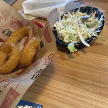 Sonny's BBQ - Side of fabulous onion rings and coleslaw . - Barbeque Near Me - Lakeland, Florida Sonny's BBQ - Side of fabulous onion rings and coleslaw . - Barbeque Near Me - Lakeland, Florida