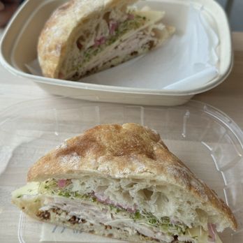 Winn Winn Cafe - Turkey sandwich with sprouts , pickled onions, Swiss cheese and Dijon mustard (with seeds). This is one portion; two halves. - Bakeries Near Me - Columbus, Ohio Winn Winn Cafe - Turkey sandwich with sprouts , pickled onions, Swiss cheese and Dijon mustard (with seeds). This is one portion; two halves. - Bakeries Near Me - Columbus, Ohio