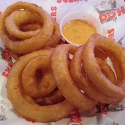 Hooters - $4.99 Onion Rings - 4 Stars - Some of the best rings, but still doesn't beat the King of the Ring! Cheddar's Casual Cafe!