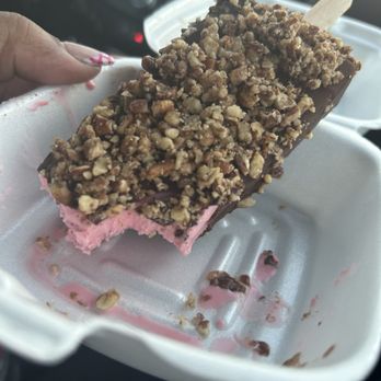 La Michoacana Plus - Milk based strawberry ice cream bat dipped in chocolate drowned in pecans.  So freaking good!!! - Ice Cream & Frozen Yogurt Near Me - Hutto, Texas