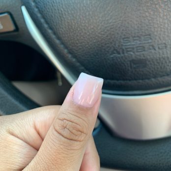 Nails So Happy - Uneven square tip nail. Has a dip in the center after I corrected the man . Still didn't fix it. - Nail Salons Near Me - Jacksonville, Florida Nails So Happy - Uneven square tip nail. Has a dip in the center after I corrected the man . Still didn't fix it. - Nail Salons Near Me - Jacksonville, Florida