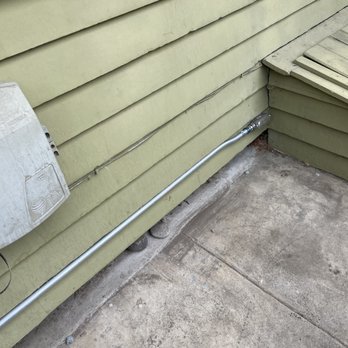 Advantage - This is a photo of the conduit Andrey ran from my basement to the shut-off switch in the previous photo. - Electricians Near Me