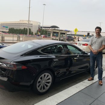 PGA Transport and Logistics - Paul's clean and environmentally friendly Tesla Model S - Airport Shuttles Near Me PGA Transport and Logistics - Paul's clean and environmentally friendly Tesla Model S - Airport Shuttles Near Me