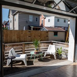 The Space - Garage door exit to deck.
