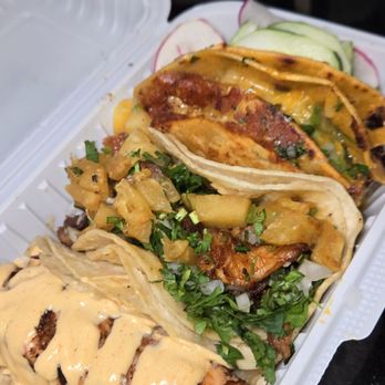 La Ruta Del Taco - Left to right: grilled salmon trap, al pastor taco, quesobirria taco - Tacos Near Me - Brooklyn, New York La Ruta Del Taco - Left to right: grilled salmon trap, al pastor taco, quesobirria taco - Tacos Near Me - Brooklyn, New York