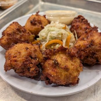 Manjay Restaurant - Caribbean Conch Fritters. $14. Manjay pikliz, honey mustard remoulade. Manjay at The Citadel. - Caribbean Near Me - Miami, Florida Manjay Restaurant - Caribbean Conch Fritters. $14. Manjay pikliz, honey mustard remoulade. Manjay at The Citadel. - Caribbean Near Me - Miami, Florida
