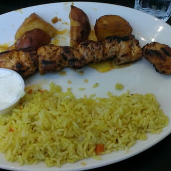 Sotiris Authentic Greek Cuisine - Chicken Souvlaki with Potatoes, Rice and a side of Tzatziki - Greek Near Me - Burlington, Ontario Sotiris Authentic Greek Cuisine - Chicken Souvlaki with Potatoes, Rice and a side of Tzatziki - Greek Near Me - Burlington, Ontario