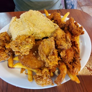 Baytown Seafood - Cat fish, oysters, shrimp and fries combination for my hubby - Seafood Near Me - Baytown, Texas