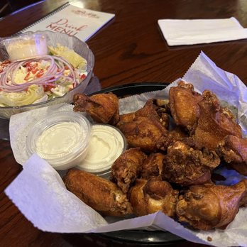 Trainwreck Saloon - Trainwreck wings and salad - Sports Bars Near Me - Saint Louis, Missouri Trainwreck Saloon - Trainwreck wings and salad - Sports Bars Near Me - Saint Louis, Missouri