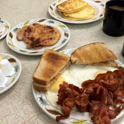 The (half!) Quebec pancakes with Canadian bacon and eggs, bacon, and toast