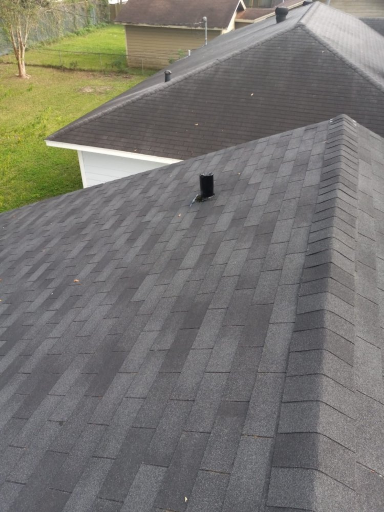 Slide of Tres Coronas Roofing