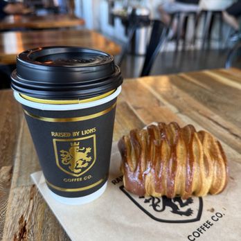 Raised By Lions Coffee - London Fog (Earl Grey Tea Latte) and chocolate croissant - Coffee & Tea Near Me - Tustin, California Raised By Lions Coffee - London Fog (Earl Grey Tea Latte) and chocolate croissant - Coffee & Tea Near Me - Tustin, California