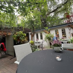 Kuchnia Domowa Sąsiedzi - Outdoor patio. Along with indoor seating, there's also tables out front.