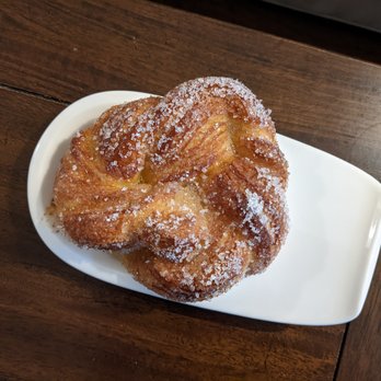 Cannelle - While this sugar-encrusted croissant looks wonderful, I was a bit disappointed by it. - Coffee & Tea Near Me - Ann Arbor, Michigan
