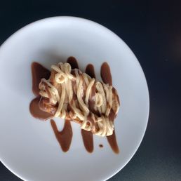 Blonde brownie with chocolate and peanut butter drizzle Blonde brownie with chocolate and peanut butter drizzle