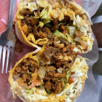 La Nacional - Burrito Al Pastor. Served with refried beans, rice, lettuce, tomato, onion, cheese, avocado, and sour cream. - Grocery Near Me - Glasgow, Kentucky