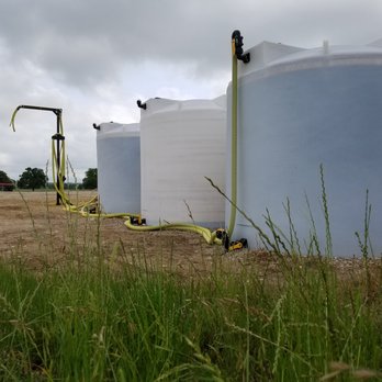 Bushman USA Texas - Liquid Feed Filling Station at a Ranch in Central Texas. These Heavy Weight Tanks are rated to store liquids that weigh 15.75 lbs. a gallon! - Local Services Near Me