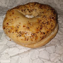 Toasted everything bagel with lox cream cheese Toasted everything bagel with lox cream cheese
