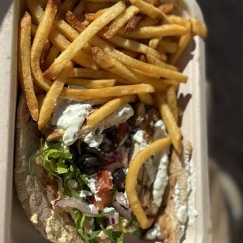Wind & Waves Market - Mediterranean pita with a side of fries - Delis Near Me - Vero Beach, Florida Wind & Waves Market - Mediterranean pita with a side of fries - Delis Near Me - Vero Beach, Florida