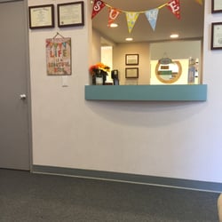 Yi-Chen Liu, DDS, MS - Front desk, plenty of seating in front of this!