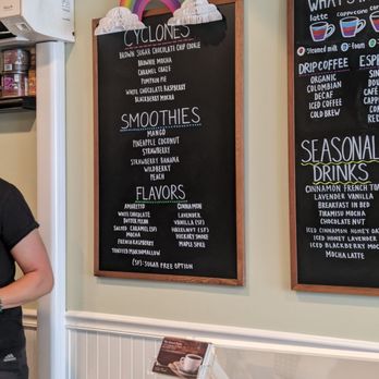 The Good Bean - a woman standing in front of a menu - Coffee & Tea Near Me - Dover, New Jersey