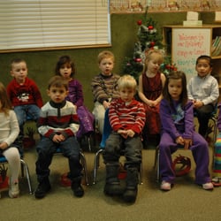 Ladybug Child Care Centers Inc - Preschoolers at their Holiday Sing-Along ready to sing with joyful voices!
