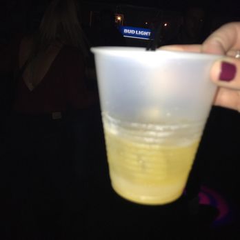 Wibs - a person holding a plastic cup in their hand - Dive Bars Near Me - Shippensburg, Pennsylvania