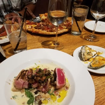 Angelo’s Taverna - Grilled yellow fin tuna and in the background sir psycho sexy pizza and my finished oysters - Italian Near Me - Denver, Colorado