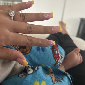 Bliss Nails & Spa - Yellow French tip with flower design - Nail Salons Near Me - Yuba City, California Bliss Nails & Spa - Yellow French tip with flower design - Nail Salons Near Me - Yuba City, California