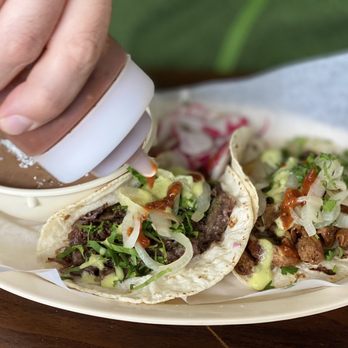 Taqueria Tío Nacho - Barbacoa taco, tripas taco on corn with a side of beans - Mexican Near Me - Georgetown, Texas Taqueria Tío Nacho - Barbacoa taco, tripas taco on corn with a side of beans - Mexican Near Me - Georgetown, Texas