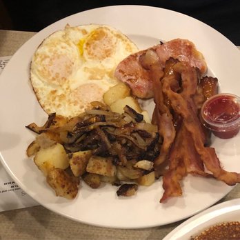 Linda's Eating Place - Part of the Hungry 3 - home fries with sautéed onions, bacon, back bacon, sausage and 3 eggs over easy - Breakfast & Brunch Near Me - Midhurst, Ontario