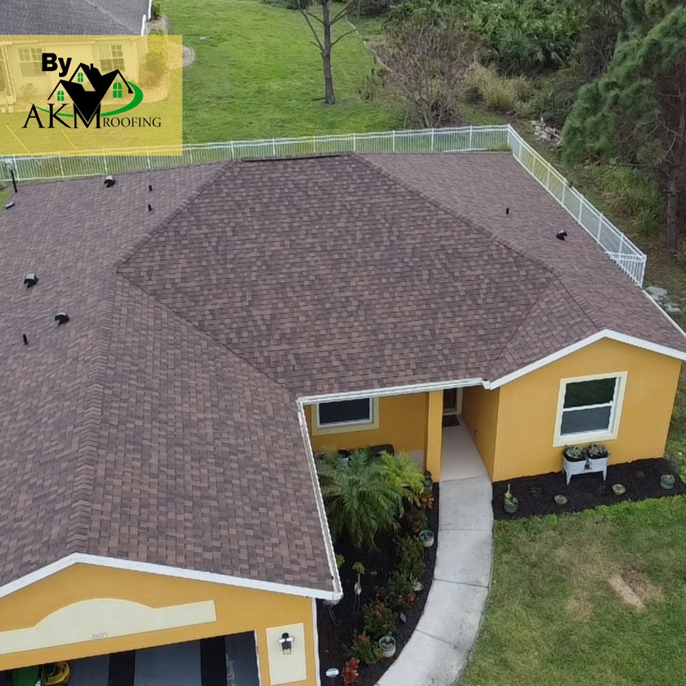 Slide of AKM Roofing