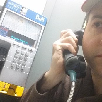 Zak's Diner - Phone booth going upstairs to the restrooms - Diners Near Me - Ottawa, Ontario