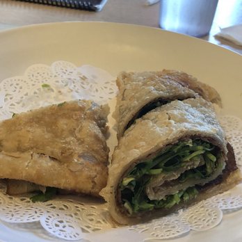 Ma's Dumpling House - Beef wrap, cut into 4 pieces(1 was eaten) - Dim Sum Near Me - Anaheim, California Ma's Dumpling House - Beef wrap, cut into 4 pieces(1 was eaten) - Dim Sum Near Me - Anaheim, California