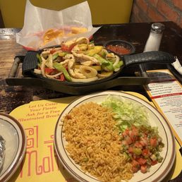 Chicken fajitas with rice and pico.