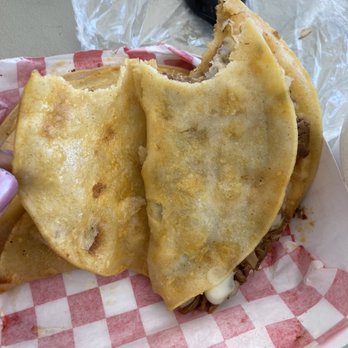 Tortas Y Tacos El Chino - No cheese in between the tortillas for the Birria tacos, only a little cheese sprinkled in with the meat. - Mexican Near Me - Aurora, Colorado Tortas Y Tacos El Chino - No cheese in between the tortillas for the Birria tacos, only a little cheese sprinkled in with the meat. - Mexican Near Me - Aurora, Colorado