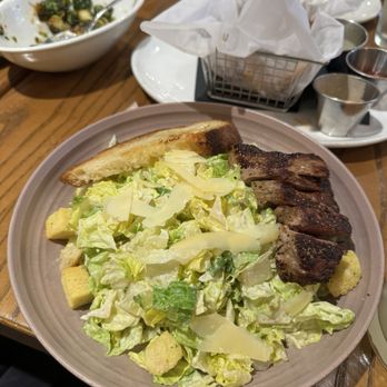 Teddy & The Bully Bar - Caesar salad with steak - New American Near Me - Washington, DC, District of Columbia Teddy & The Bully Bar - Caesar salad with steak - New American Near Me - Washington, DC, District of Columbia